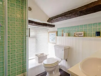 a bathroom with a toilet and a sink at 3 Bed in Grange-over-sands oc-83368 in Cartmel