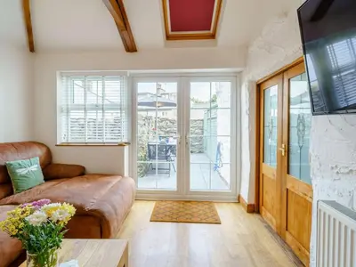 a living room with a couch and a table at 3 Bed in Grange-over-sands oc-83368 in Cartmel
