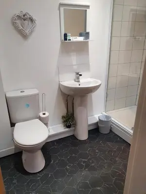 a bathroom with a toilet and a sink at Blackpool Central Beach Apartments in Blackpool