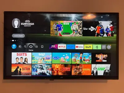 a television screen with many games on it at Riverside by Teil in Preston