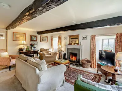 a living room filled with furniture and a fireplace at 3 Bed in Ulverston oc-91779 in Haverthwaite