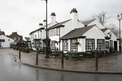 a pub on the side of a street at Botanic Mews in Southport