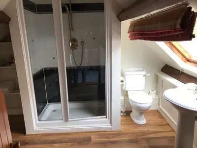 a bathroom with a shower and a toilet at st marys mount in Ulverston