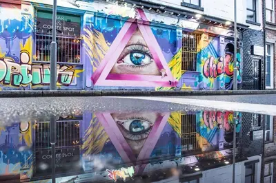 a mural of an eye on the side of a building at Camden Apartments 2 in Liverpool