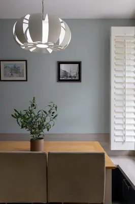 a dining room with a table and a chandelier at Flatzy - 3 Bedroom Apartment in Heart of City Centre in Liverpool