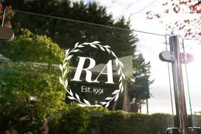 a sign that says ra on the side of a building at Rufford Arms Hotel in Rufford