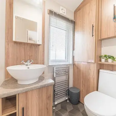 Tastefully decorated lodge on popular holiday park