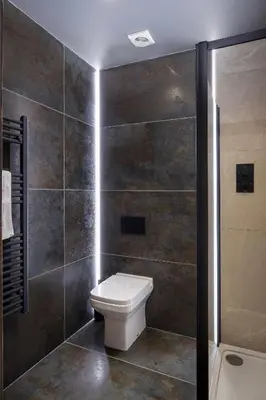 a bathroom with a toilet and a shower at The Charleston in Blackpool