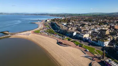 an aerial view of a beach with buildings at The Bolt Hole in Morecambe