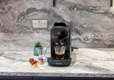 a coffee maker sitting on a counter with a drink at Winckley Chambers in Preston