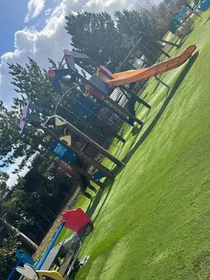 a group of playground equipment in a park at McCanns Caravan Marton Mere in Blackpool