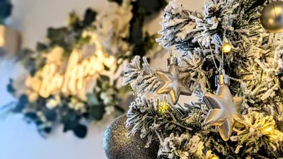 a christmas tree decorated with gold and silver ornaments at The road to Wigan Pier in Pemberton