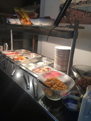 a buffet line with many different types of food at Happy Return Hotel in Blackpool