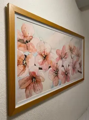 a painting of pink flowers on a wall at Garnett - Comfy apartment, great location! in Clitheroe