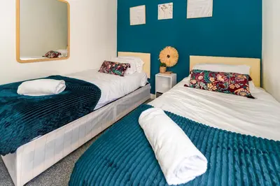two beds sitting next to each other in a room at Liverpool City Haven-Dane Street in Liverpool