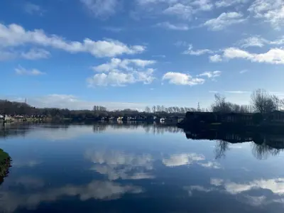 a view of a large lake with clouds in the sky at 26 Sherwood, South Lakeland Leisure Village in Carnforth