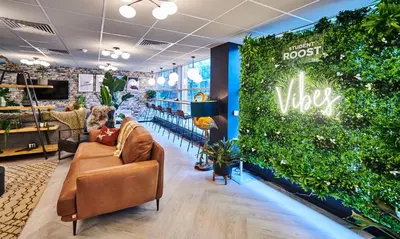 a large green wall in a store at For Students Only - Capital Gate in Liverpool in Liverpool