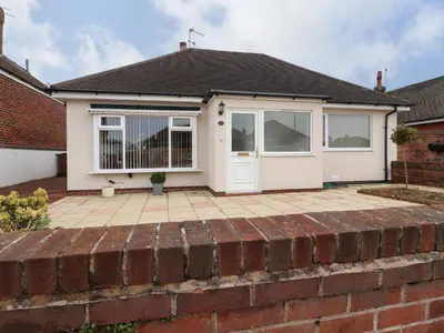 a bedroom detached house with a brick patio at 14 Berwick Road in Lytham St Annes