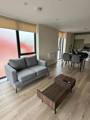 a living room with a couch and a coffee table at Richmond Row by L3 Apartments in Liverpool