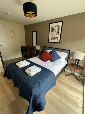 a bedroom with a bed with two towels on it at Richmond Row by L3 Apartments in Liverpool