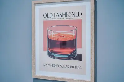 a picture of a glass of water in a wooden frame at The Seven Suites Liverpool in Liverpool