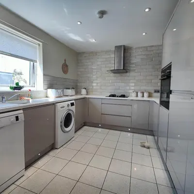 a kitchen with a washer and a sink and a dishwasher at Liverpool Stays - Kempston Court in Liverpool