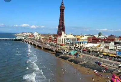 a view of a beach with the eiffel tower at Beach Flat Lytham St Annes in Lytham St Annes