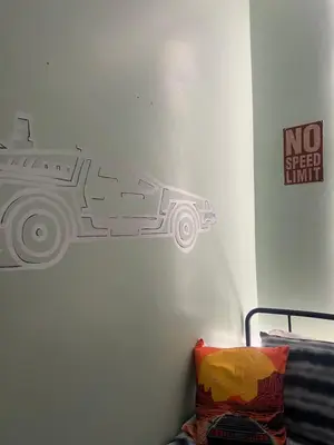 a drawing of a car on a wall at Winter Gardens large modern home in Blackpool