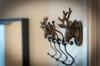 a hanger with a deer head on a wall at 40 The Gill - Ulverston Town Centre in Ulverston
