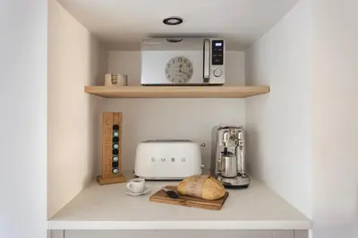 a kitchen with a shelf with a toaster and a blender at Wharton Cottage, Cartmel, Lake District Retreat - Ridgestone in Cartmel