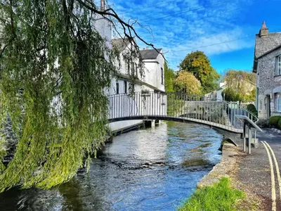 a bridge over a river in a small town at Uk46865 - Helvellyn in Ulverston
