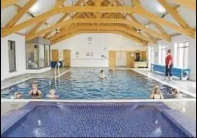 a group of people in a swimming pool at Angella's Caravan - Morecambe in Morecambe