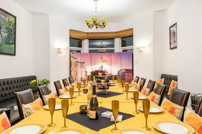 a conference room with a long table and chairs at Christian Retreat Holiday Let in Blackpool