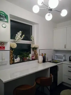 a kitchen with a counter and a window at Christian Retreat Holiday Let in Blackpool