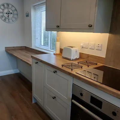 a kitchen with a counter top with a toaster on it at Sunnydale, Cartmel in Cartmel