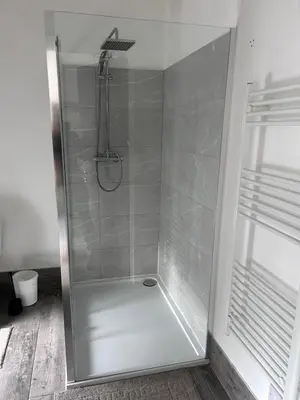 a shower with a glass door in a bathroom at Triple room Private Bath Near LFC Free Street Parking No Breakfast in Liverpool