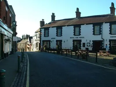 a street in a town with a white building at TOPC - Old Posthouse Flat in Garstang