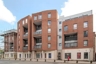 an apartment building on the corner of a street at 2 bed 2 bath city centre sleep 7 in Liverpool