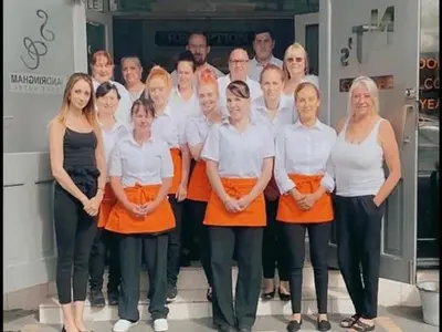 a group of people posing for a picture at The Sandringham Court Hotel & Apartment Welcoming Large and Small Groups for 16 years in Blackpool