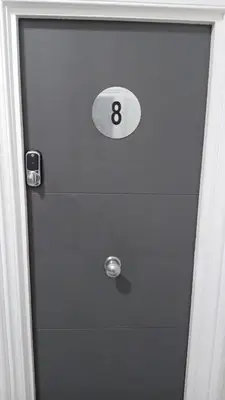 a door with the number eight on top of a drawer at Single Room with Private Bath Free Street Parking Near LFC No Breakfast in Liverpool