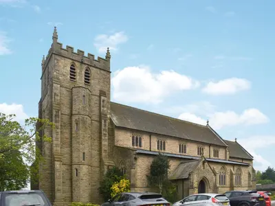 an old church with cars parked in front of it at Church View in Longridge