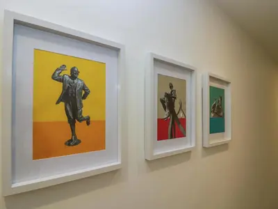 a group of three framed artworks on a wall at Brynmar in Morecambe