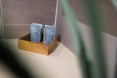 two blue candles sitting in a wooden box at Chavasse Apartments, 1 Bed Studio, Parking - Pass the Keys in Liverpool