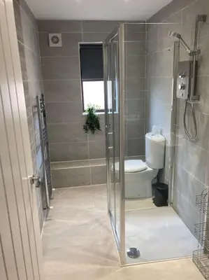 a bathroom with a shower and a toilet at Rockley Green House - 3 Bedroom Home in Liverpool in Liverpool