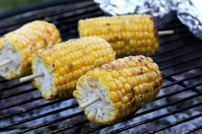 four corn on the cob on a grill at Snipe - Bleasdale in Chipping