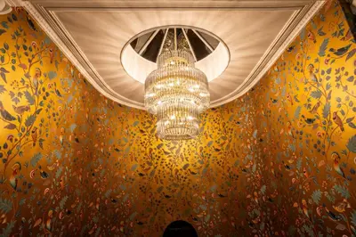 a chandelier hanging from a ceiling in a room at Aynsome Manor in Cartmel