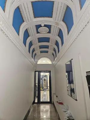 a hallway with a ceiling with blue skies at 2 Bedroom City Centre Penthouse Loft Apartment in Liverpool
