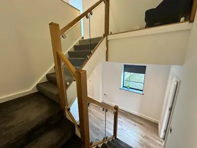 a staircase in a house with a window at Dale Street Apartments Liverpool by Beehosting in Liverpool