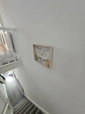 a clock hanging on a wall in a room at City Centre - Comfy 6 beds - Up to 30 percent off - Contractors delight in Liverpool