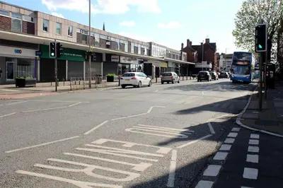 a busy city street with cars and a bus at Beautiful Home Away From Home - 3 Bedrooms - 6 Beds - Sleeps 7 - Free Parking in Liverpool